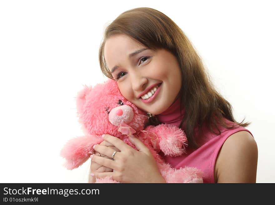 The girl with a pink teddy bear