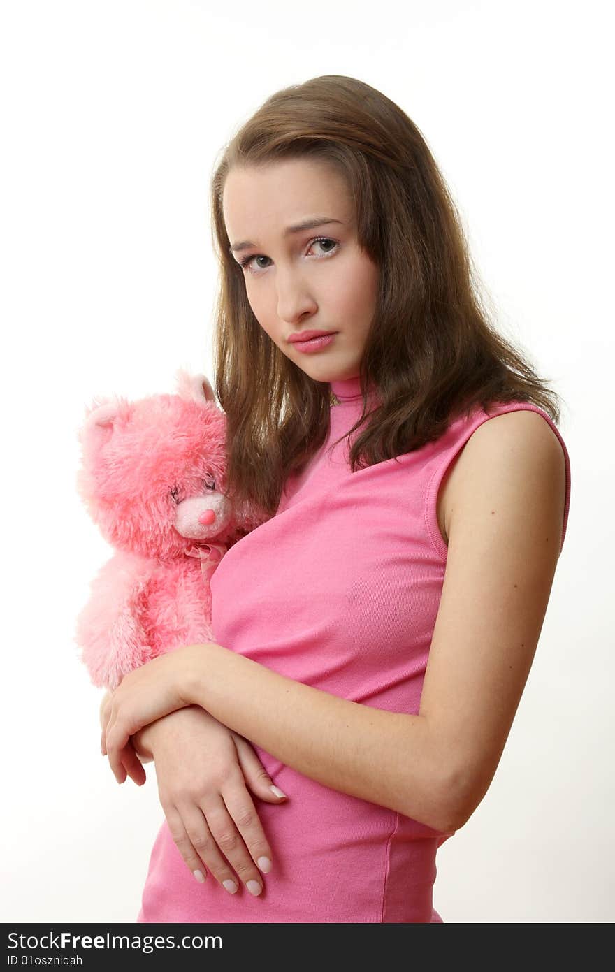 The girl with a pink teddy bear