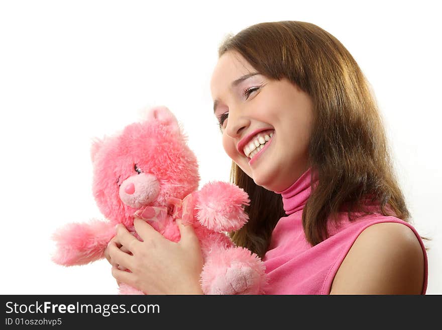 The girl with a pink teddy bear