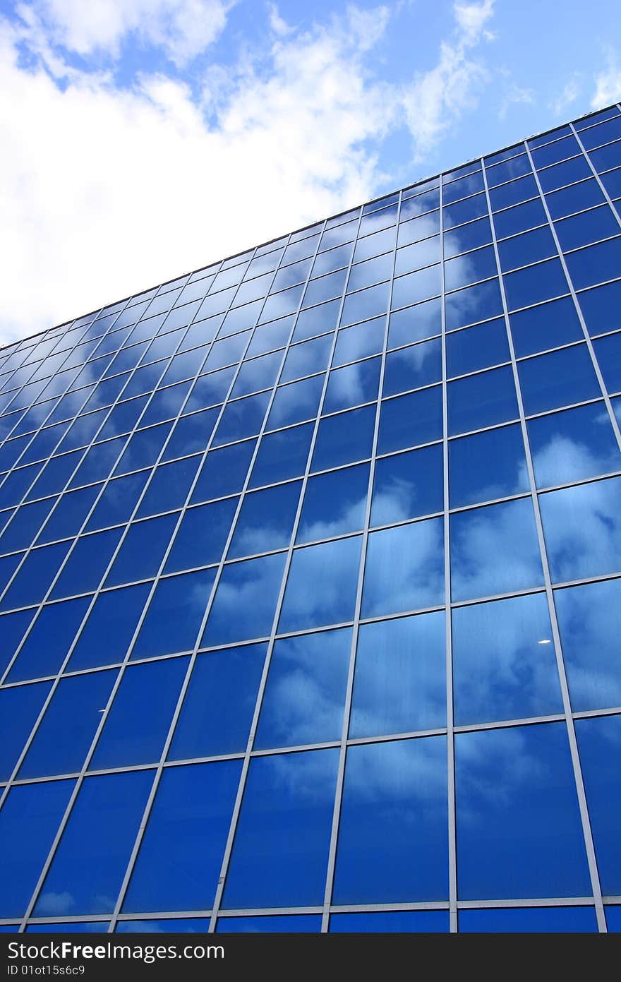 Facade of a modern building from glass and a steel