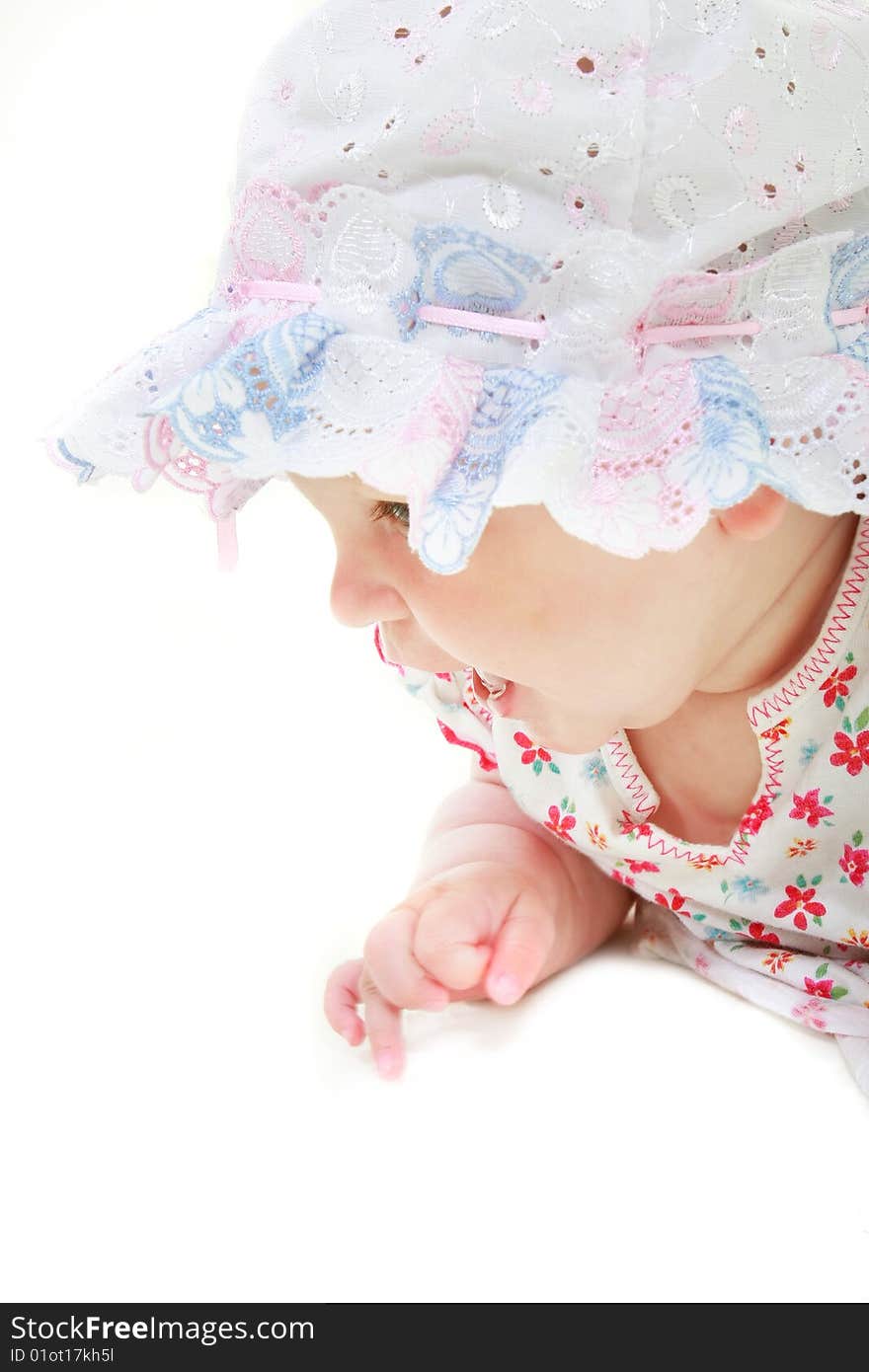 Baby girl in hat portrait