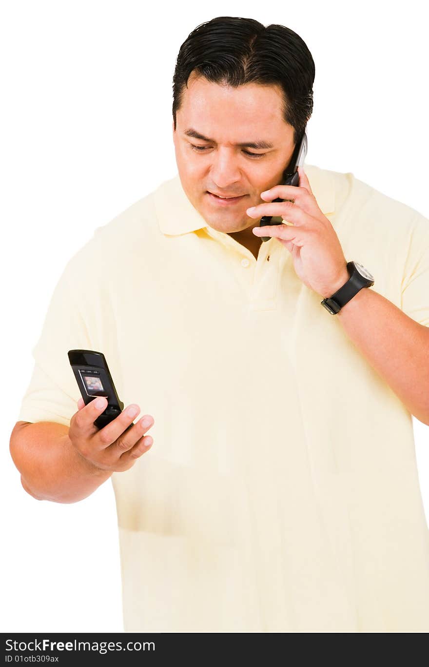 Mid adult man using a mobile phone isolated over white. Mid adult man using a mobile phone isolated over white