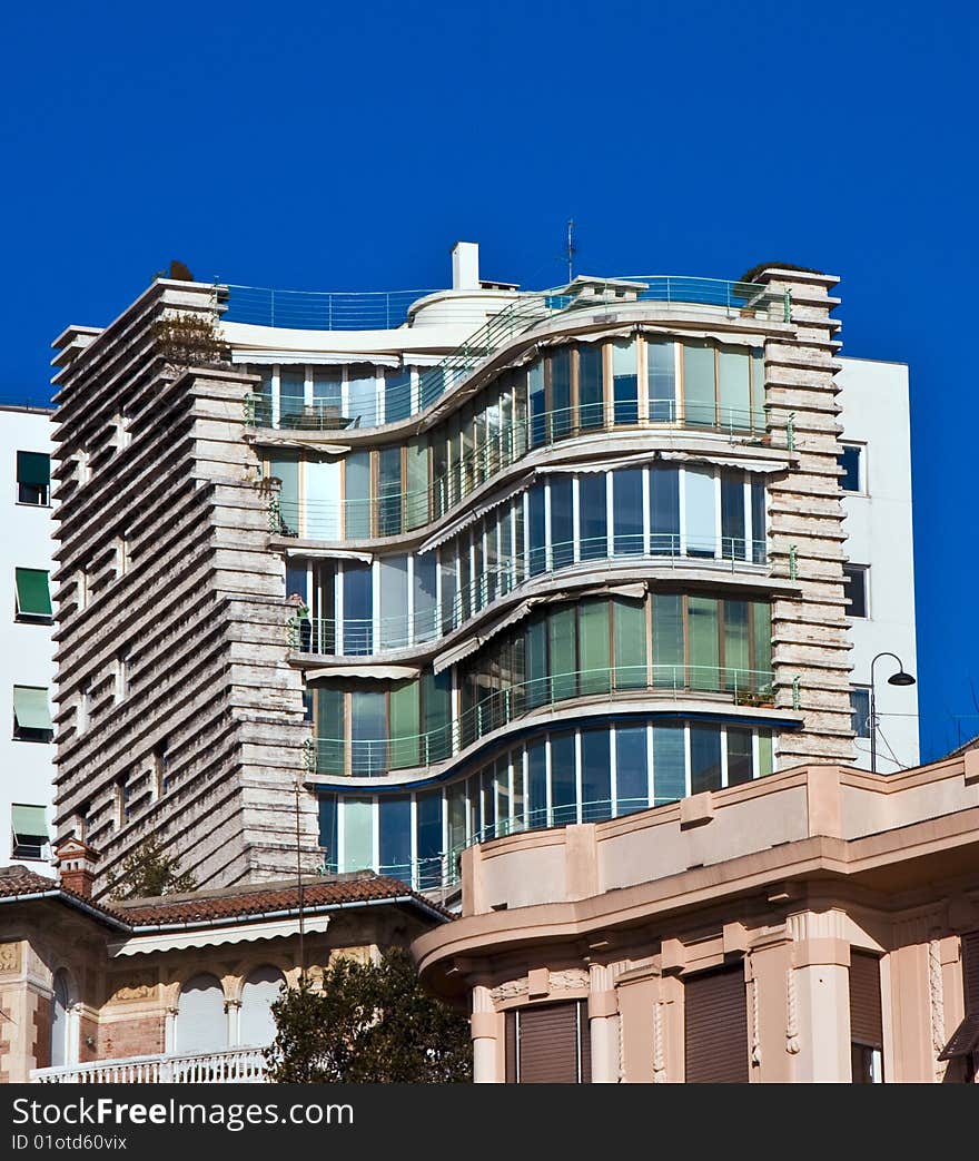 Apartments in a modern building in Genoa, Italy. Modern italian architecture. Apartments in a modern building in Genoa, Italy. Modern italian architecture