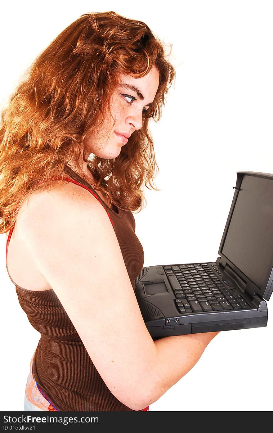 A young red haired schoolgirl in her uniform lying on the floor with the
laptop and thinking about her homework. A young red haired schoolgirl in her uniform lying on the floor with the
laptop and thinking about her homework.