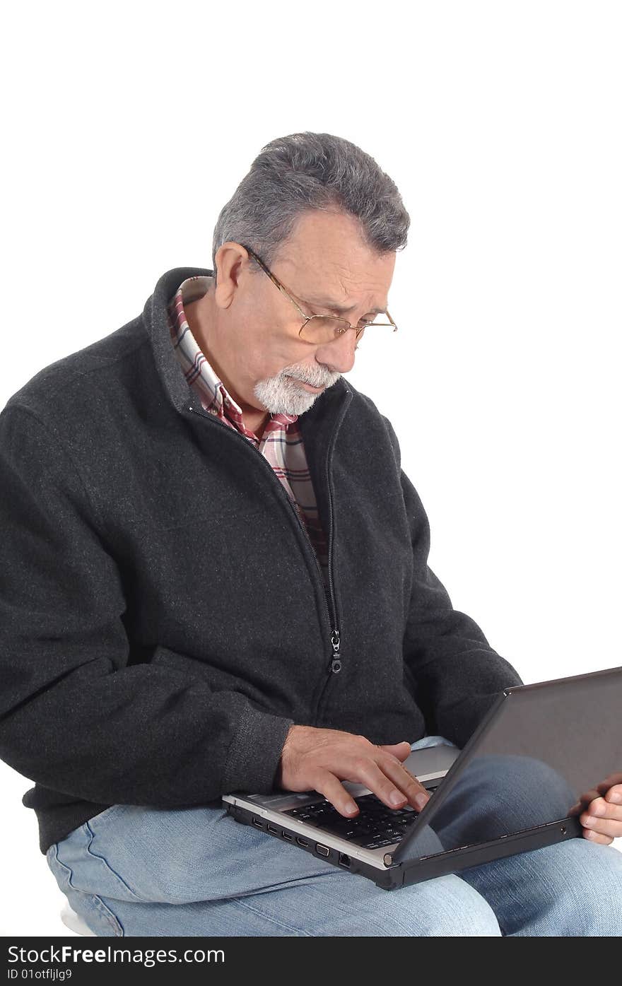 Senior with laptop computer isolated on white background