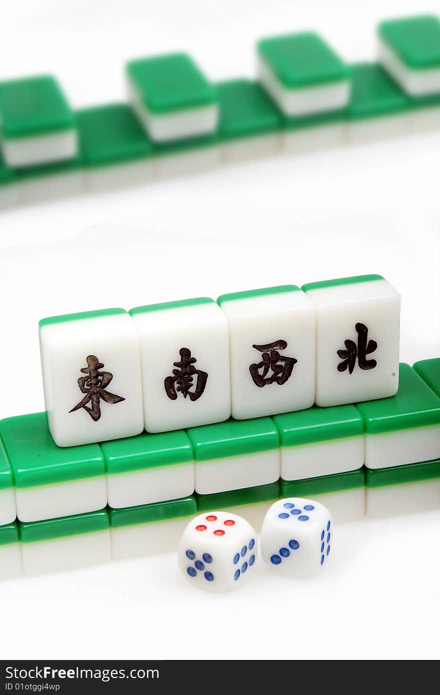 Here is a set of mahjong tiles. Mahjong tiles representing the four compass points in chinese. Here is a set of mahjong tiles. Mahjong tiles representing the four compass points in chinese.