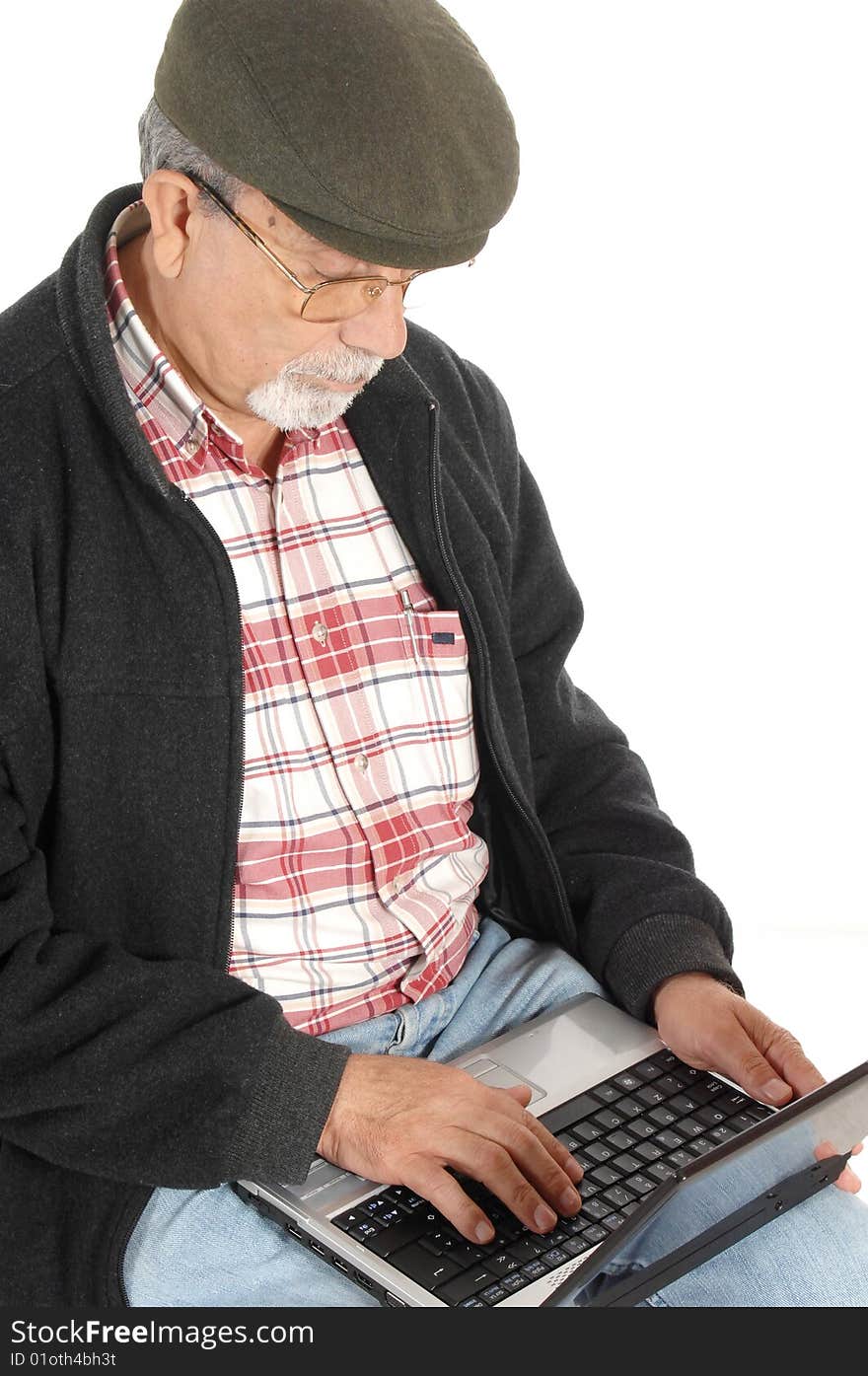 Senior with laptop computer isolated on white background