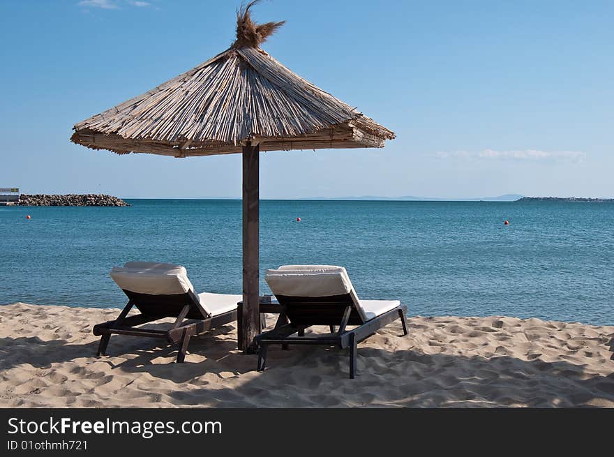 Chaise lounge on the bank of the black sea. Chaise lounge on the bank of the black sea