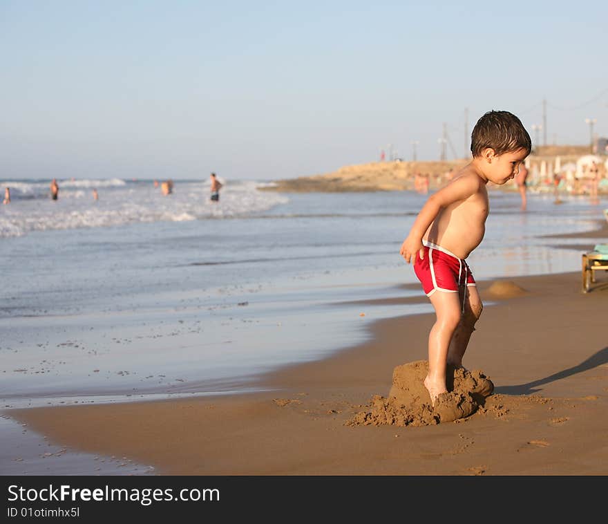 Boy At The Beach