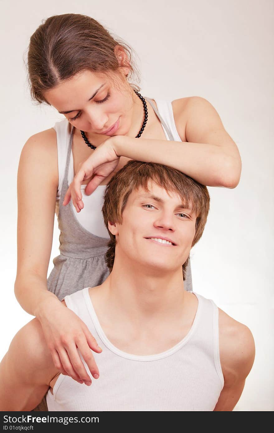 Young man and girl together on white background. Young man and girl together on white background