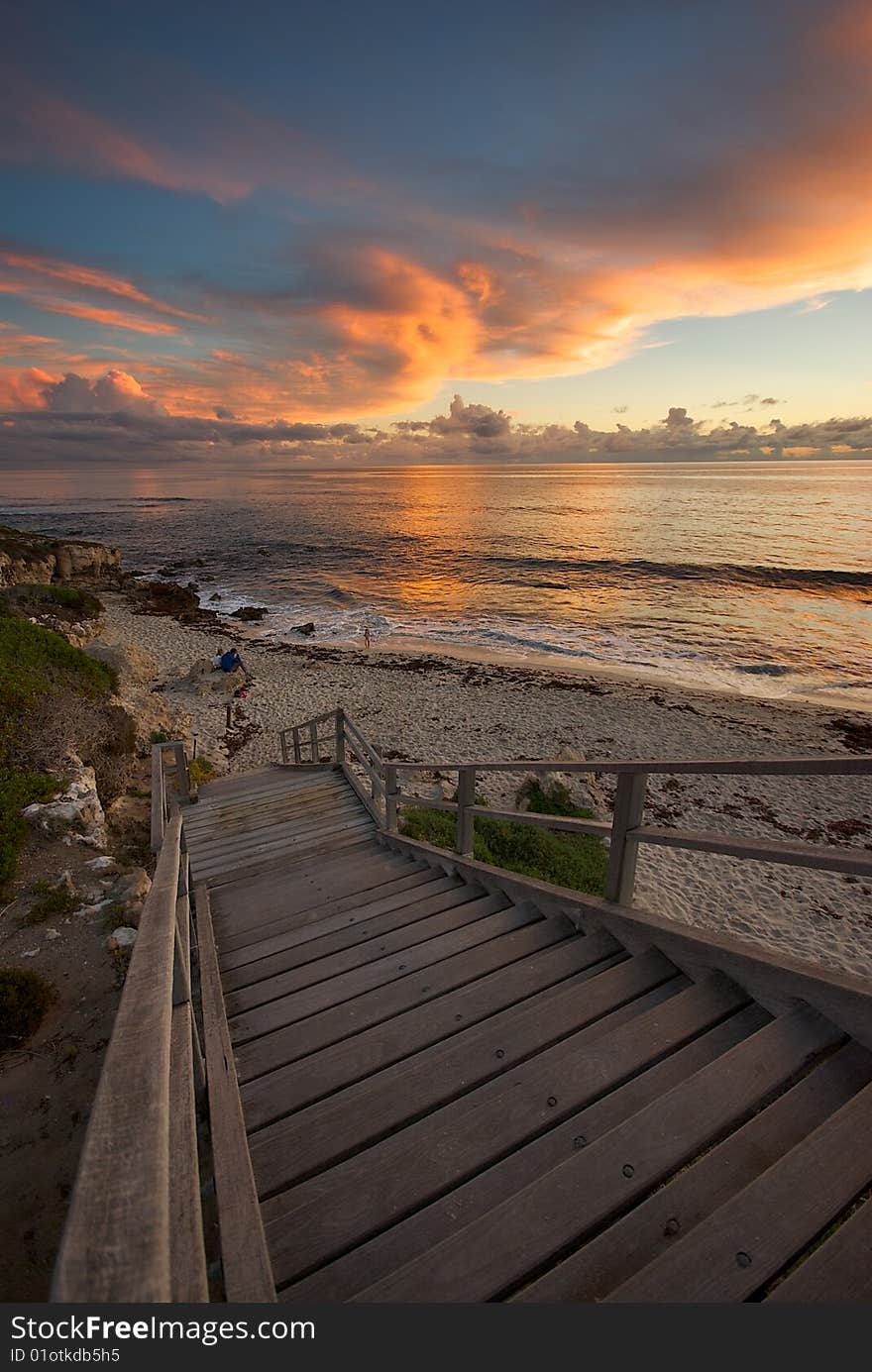 Stairway to the beach at sunset. Stairway to the beach at sunset