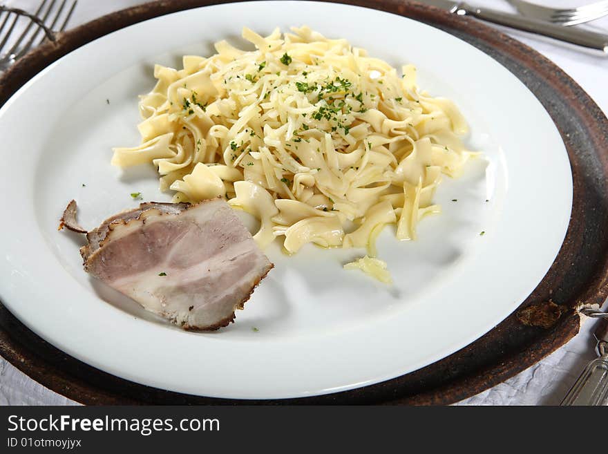 Fresh pasta with cheese and ham