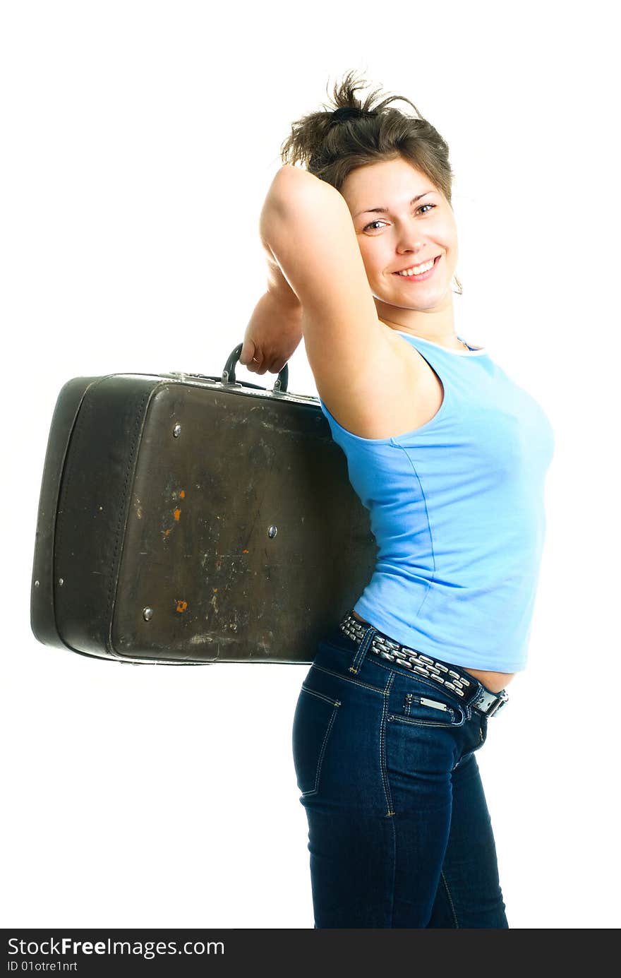 Portrait of a happy young beautiful woman with an old leather suitcase. Portrait of a happy young beautiful woman with an old leather suitcase