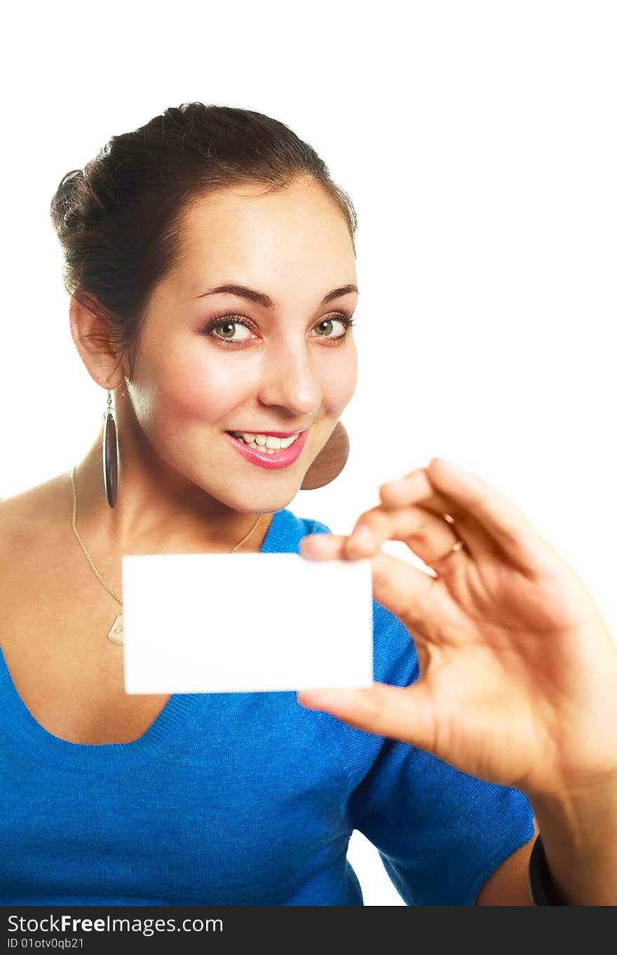 Young cheerful businesswoman showing us a business card (focus on the woman). Young cheerful businesswoman showing us a business card (focus on the woman)