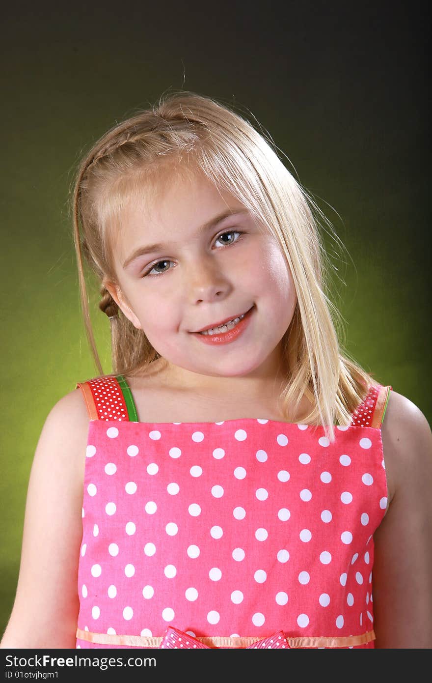 A childs portrait on a black background. A childs portrait on a black background