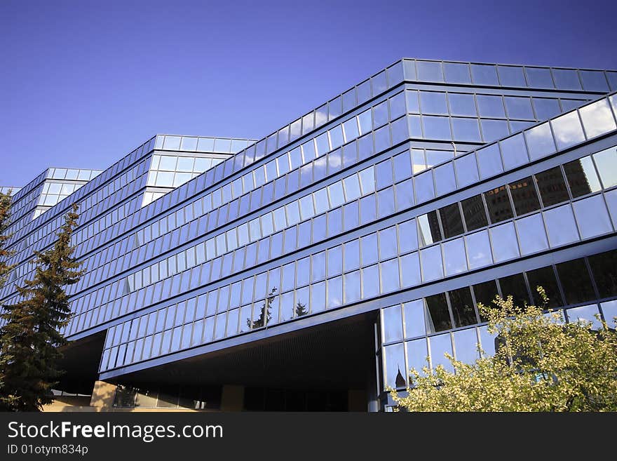 Detail of blue glass office building