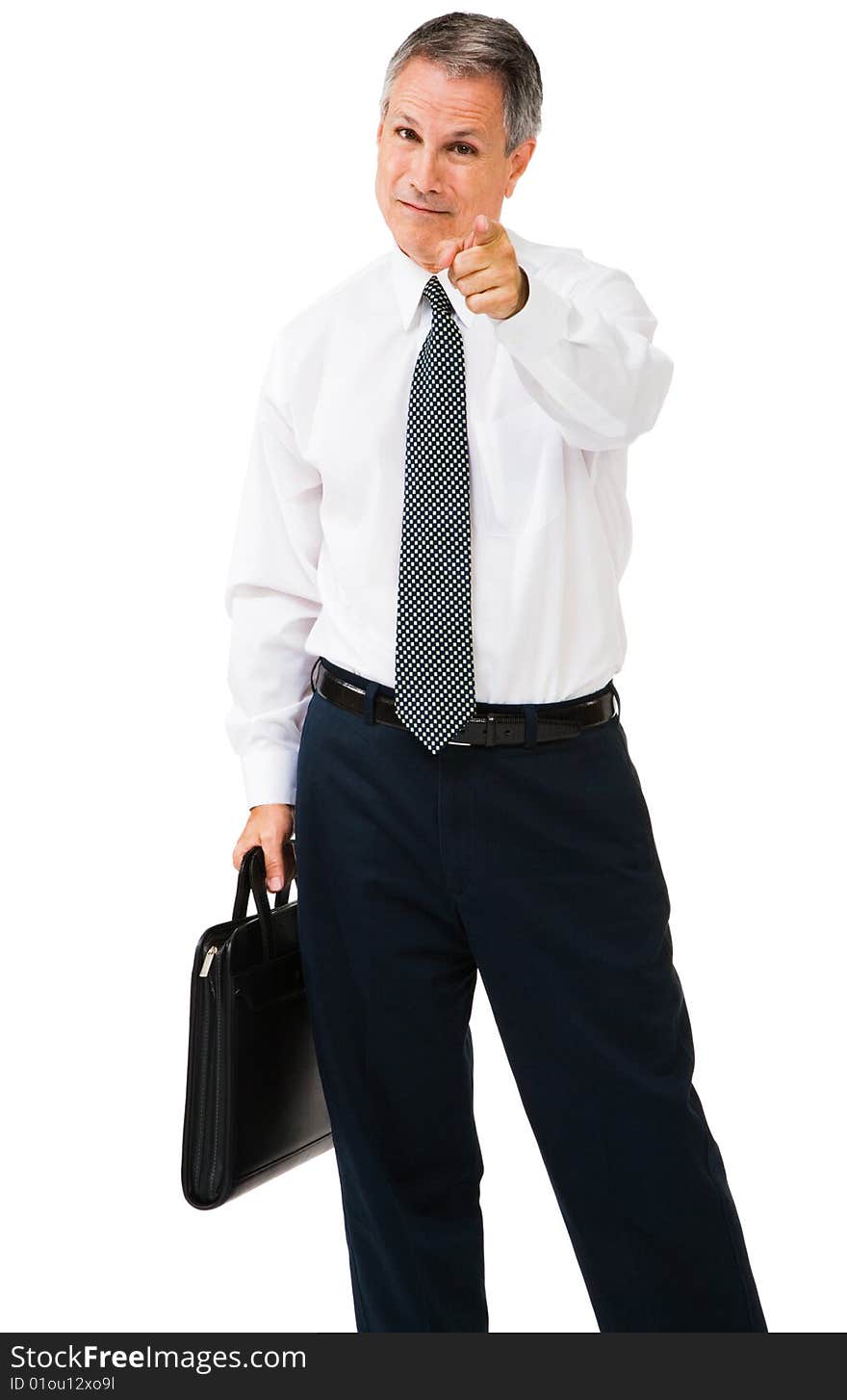 Businesman carrying a briefcase and pointing isolated over white. Businesman carrying a briefcase and pointing isolated over white