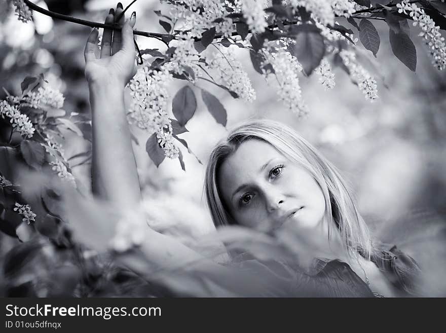 Portrait of woman in red dress in nature