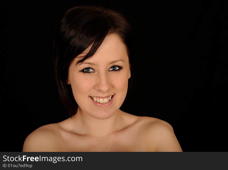 Pretty teenage woman on black background. Pretty teenage woman on black background