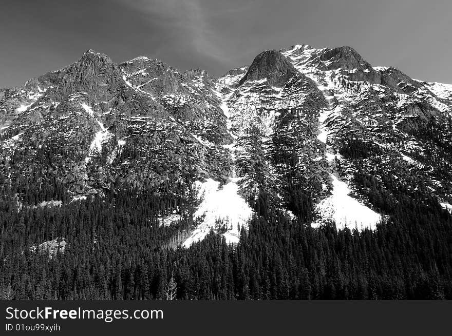 Snow melting from the mountains of the North Cascades range in Summer. Snow melting from the mountains of the North Cascades range in Summer