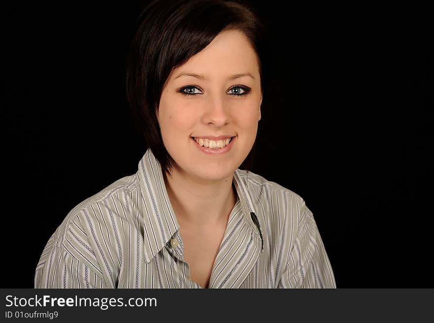 Pretty teenage woman on black background. Pretty teenage woman on black background