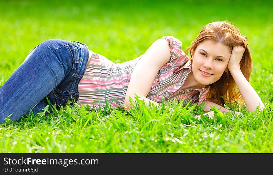 Beautiful smiling girl relaxing outdoors. Beautiful smiling girl relaxing outdoors