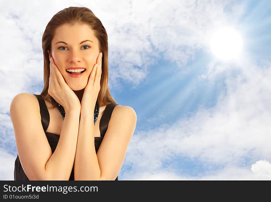 Beautiful Girl Against The Blue Sky With Clouds