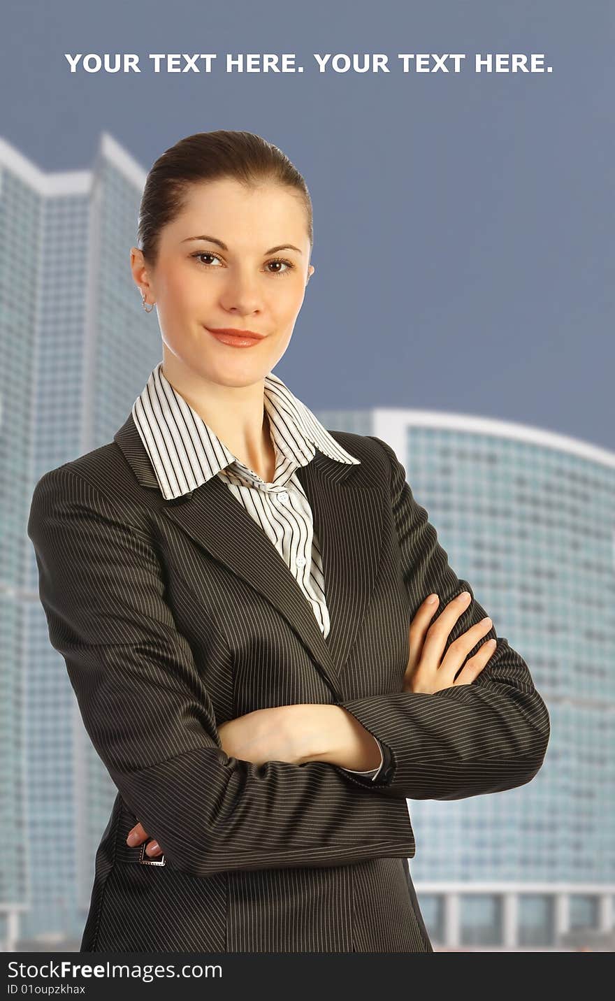 Attractive business woman against business center