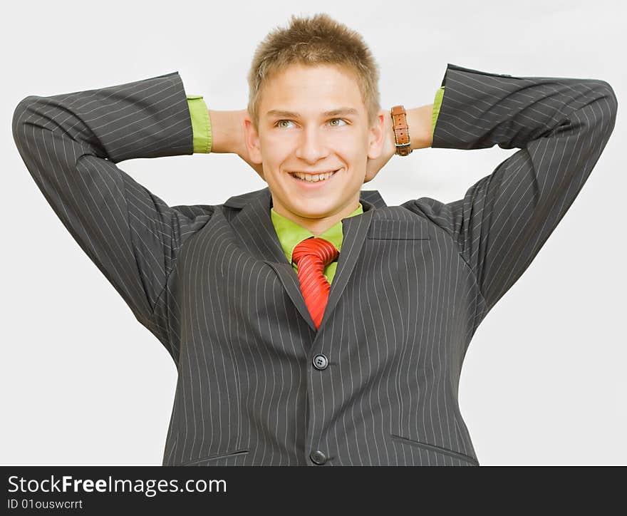 Young happy successful  businessman on white background