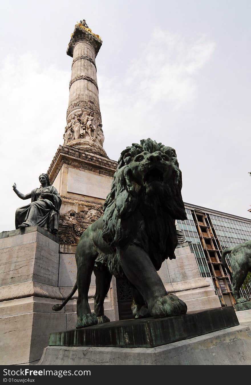 Memorial with a column and lion statue in Brussels. Memorial with a column and lion statue in Brussels