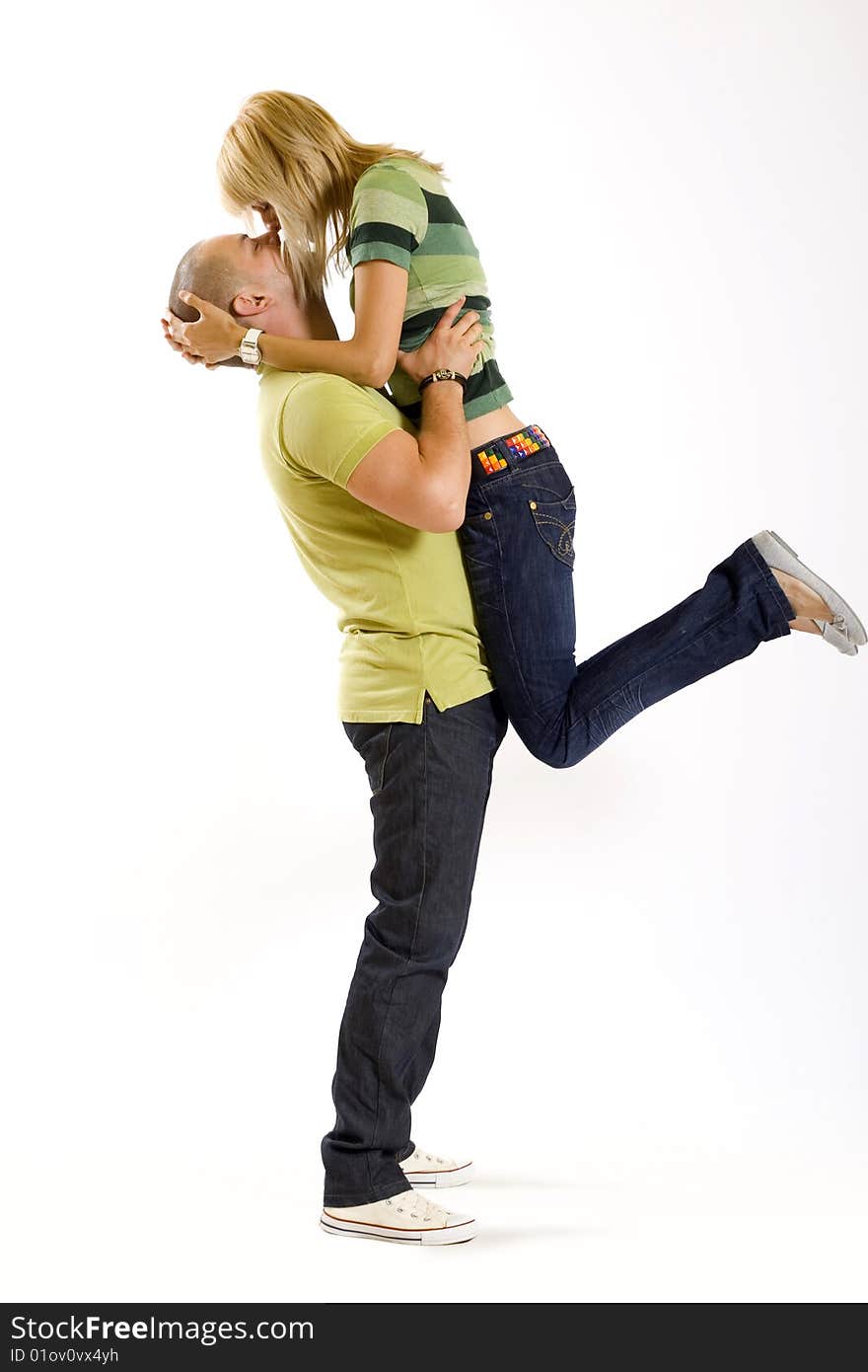 Man holding his girlfriend in the air