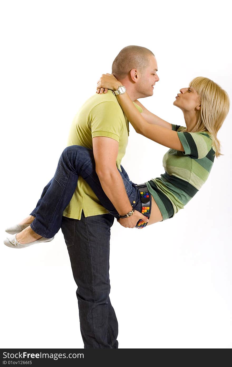 Man holding his girlfriend in the air