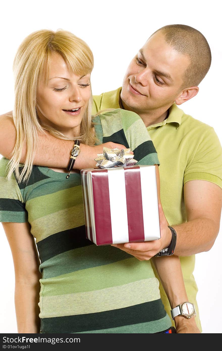 Man giving a present tot his girlfriend