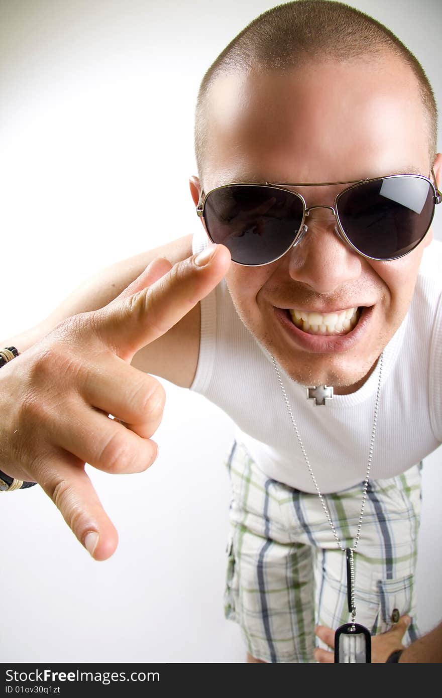 Dynamic picture of a casual young man screaming