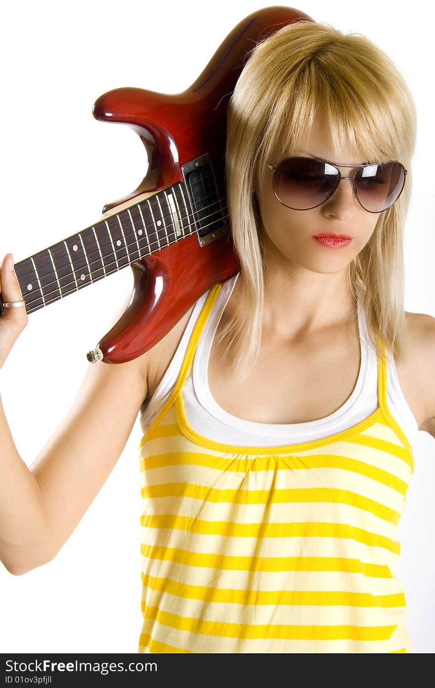 Portrait of an attractive woman guitarist