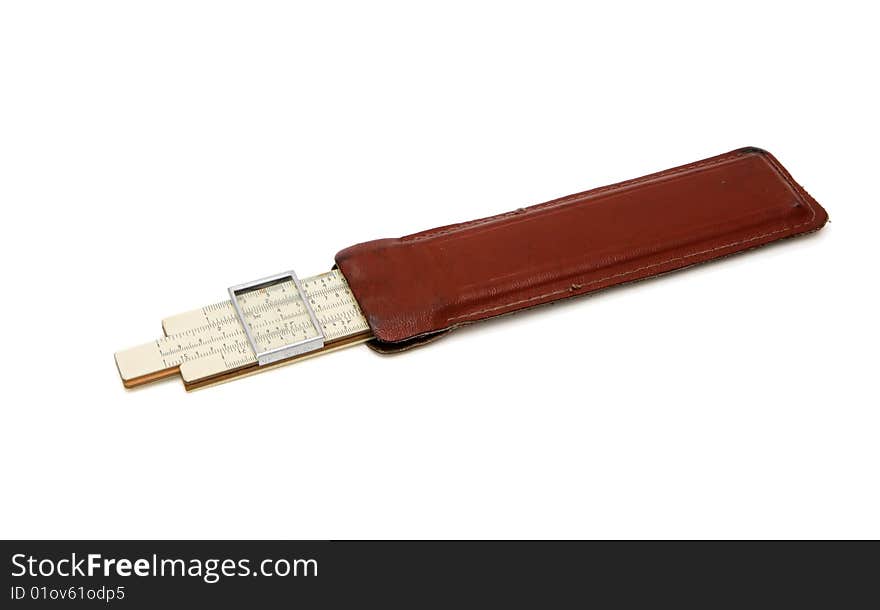 Old pocket slide rule in leather case isolated