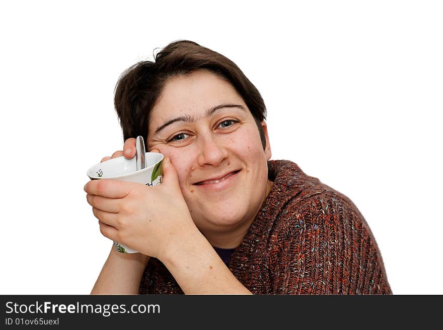 Smiling mid age woman holding a cup isolated. Smiling mid age woman holding a cup isolated