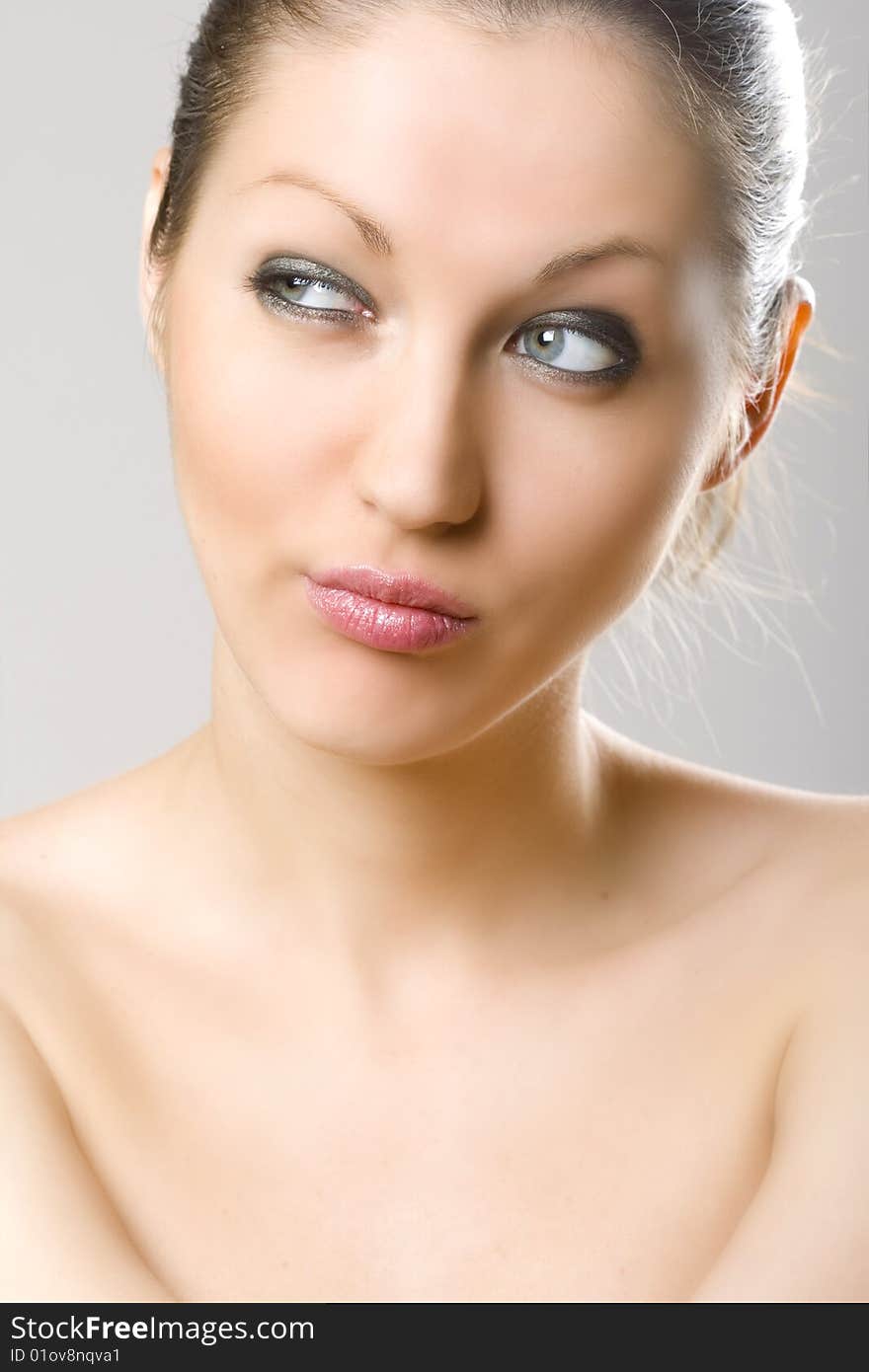 Closeup of an attractive woman\'s face - looking at her right side. Closeup of an attractive woman\'s face - looking at her right side