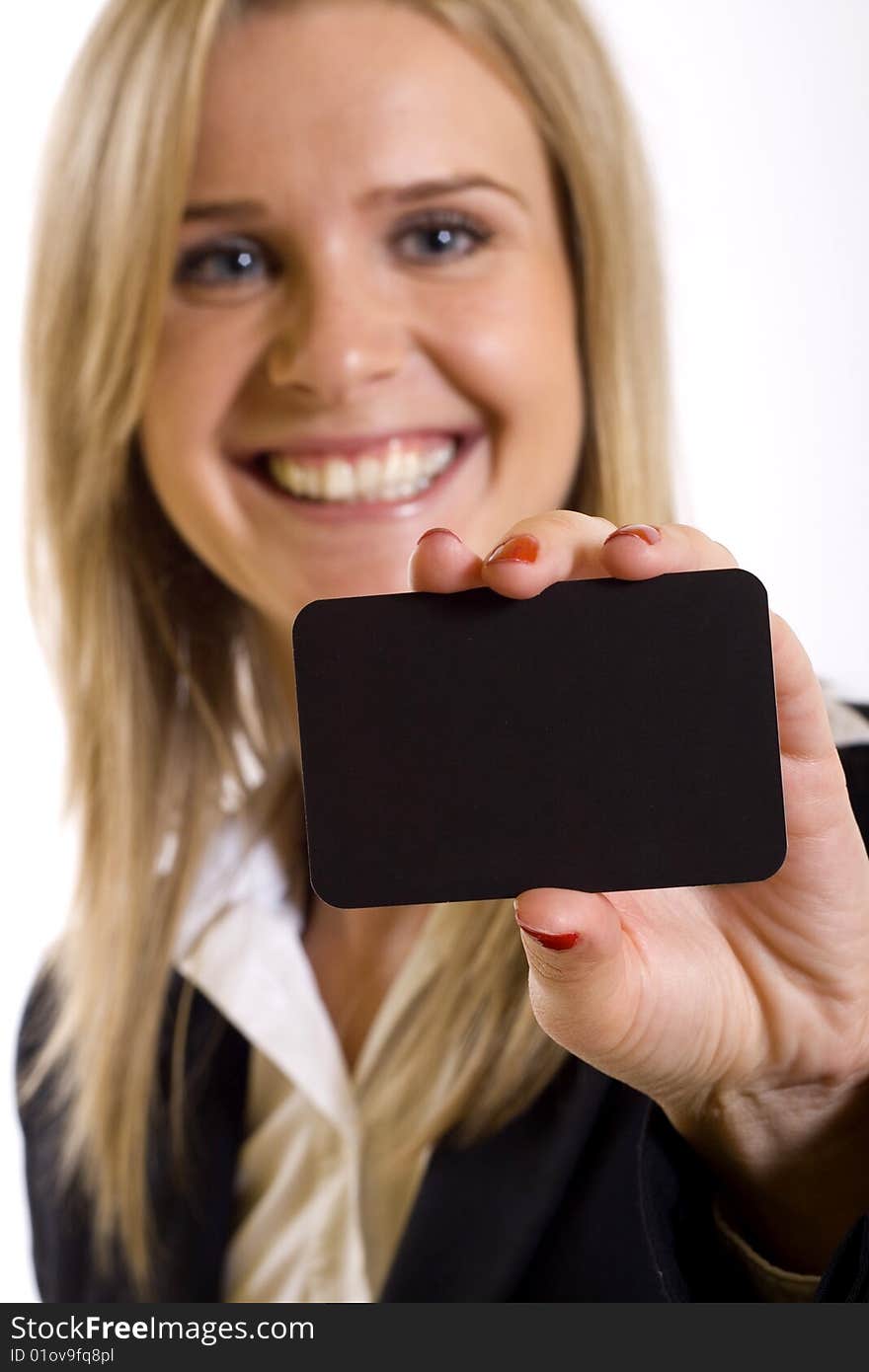 Attractive businesswoman holding a blank board