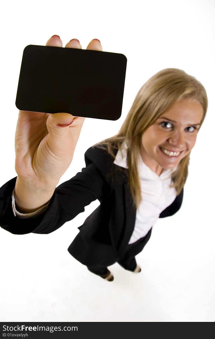 Wide angle picture of an attractive businesswoman presenting a blank card