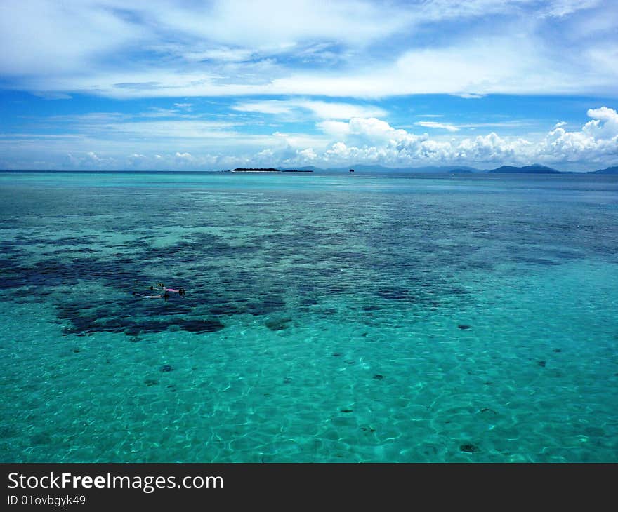 Two girls snorkelling at the beautiful kapalai island. Two girls snorkelling at the beautiful kapalai island