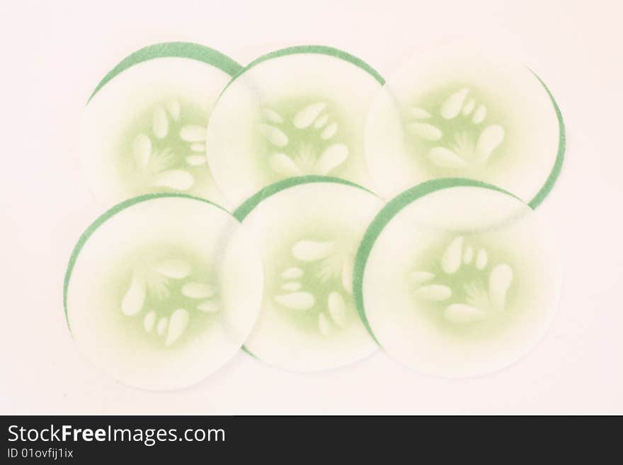 Six cucumber eyepads to refresh the eyes with white background