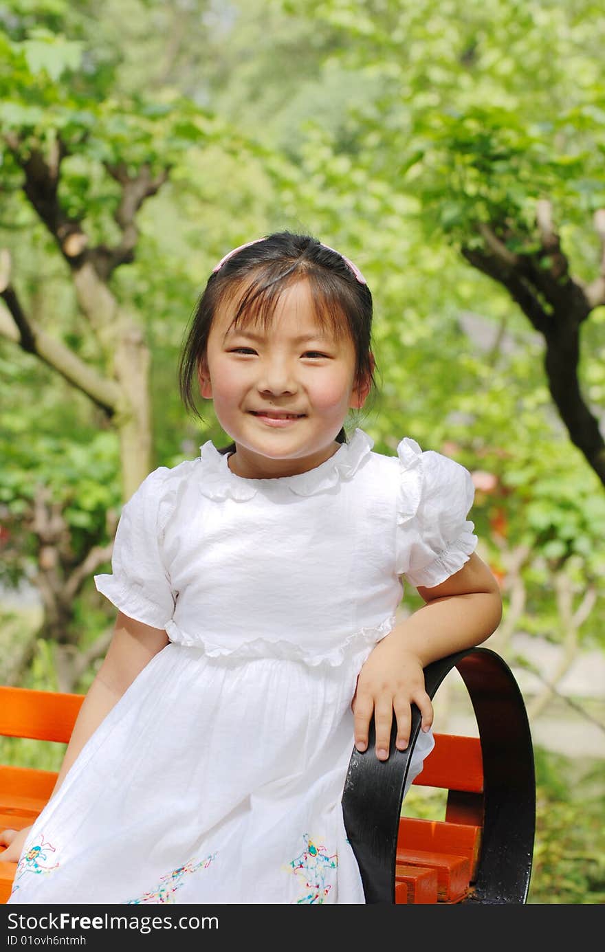 Beautiful little girl in white