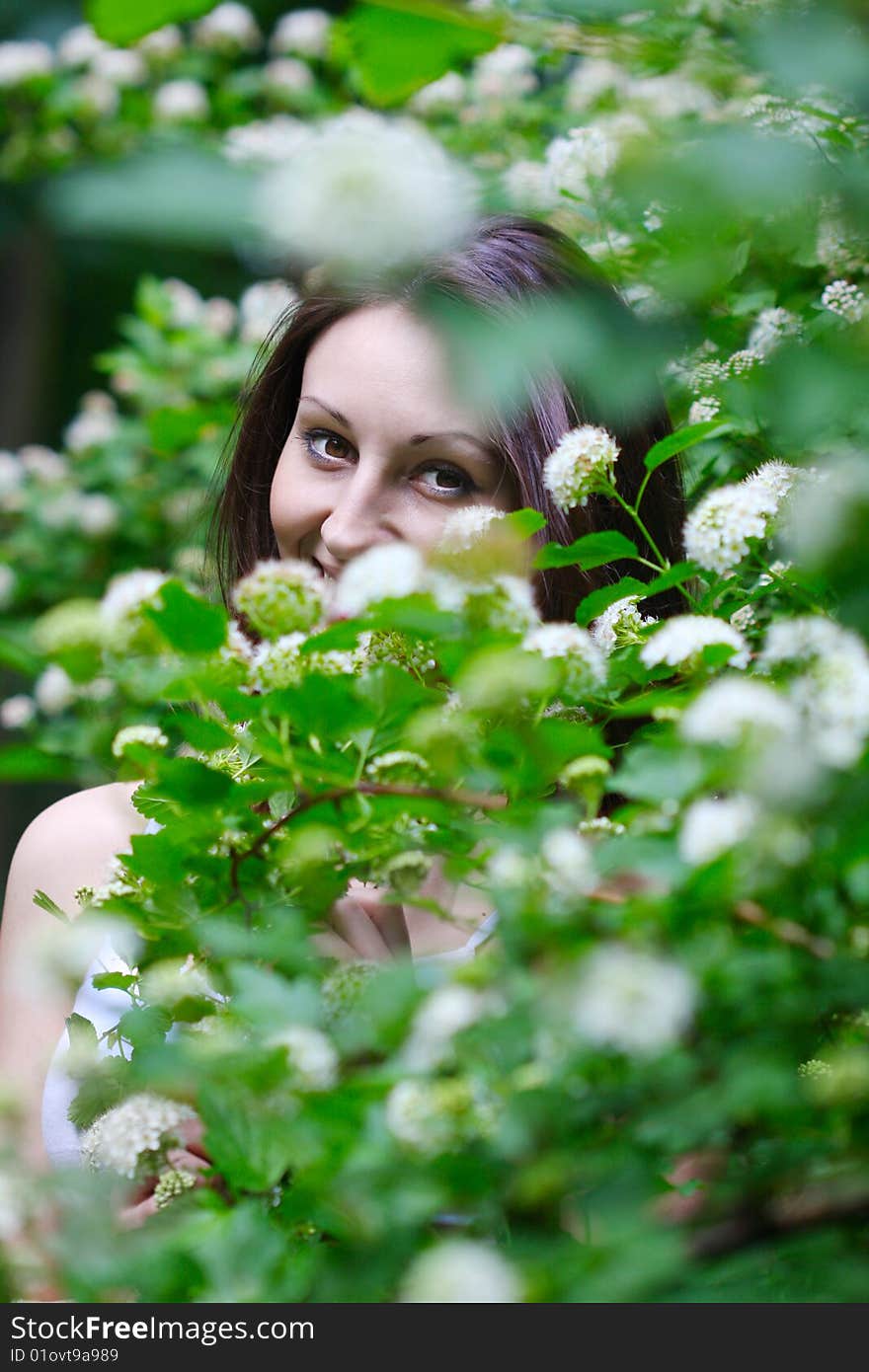 A portrait of beautiful woman is in flowers