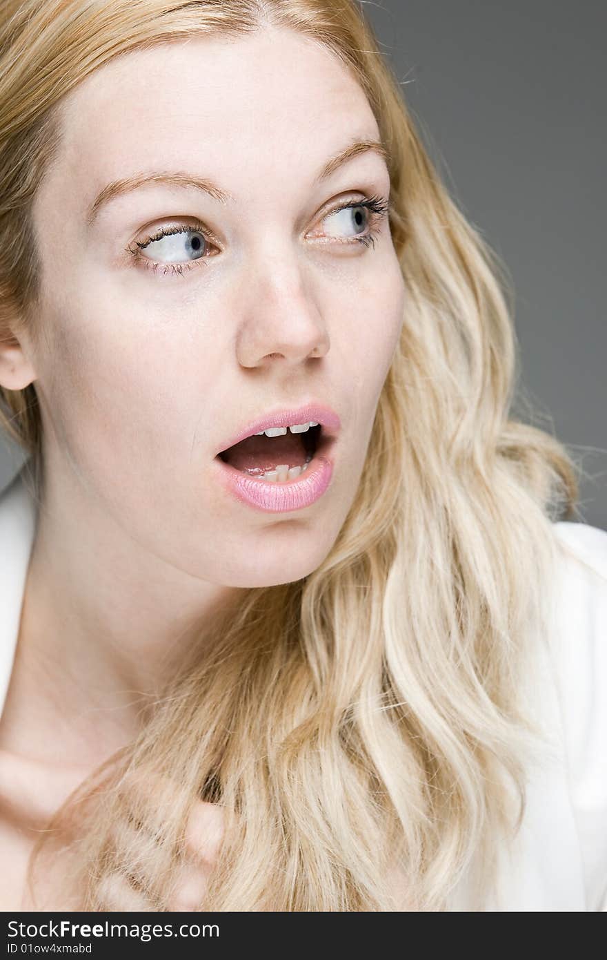 A young woman with a surprised look