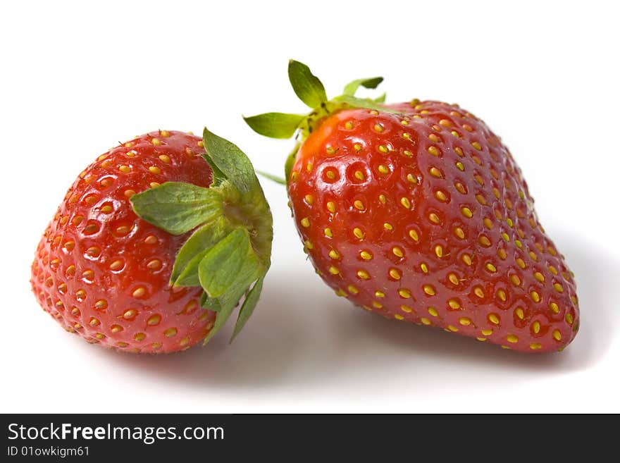 Two ripe and appetizing strawberries.