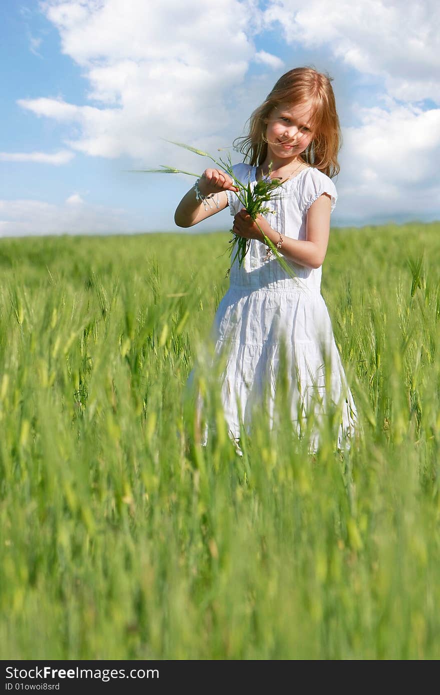 Girl in wheat field portrait