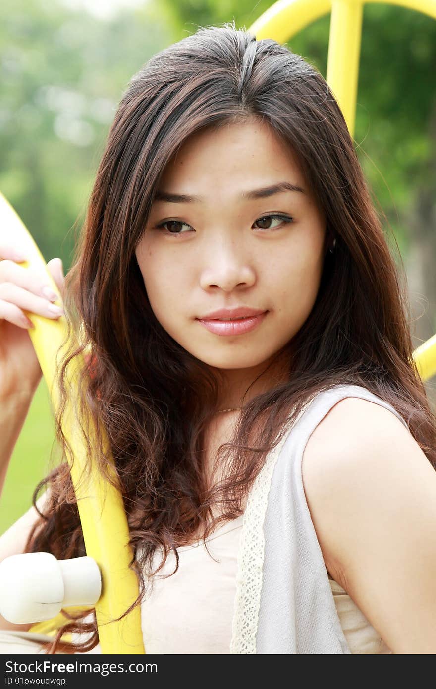 Asian girl's outdoor portrait in summer. Asian girl's outdoor portrait in summer.