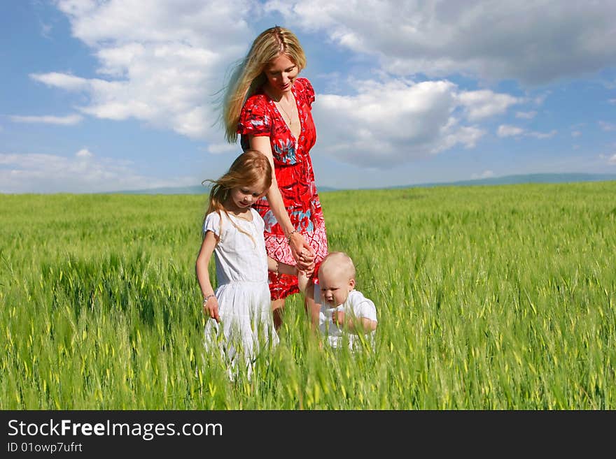 Mother And Two Children Outdoors