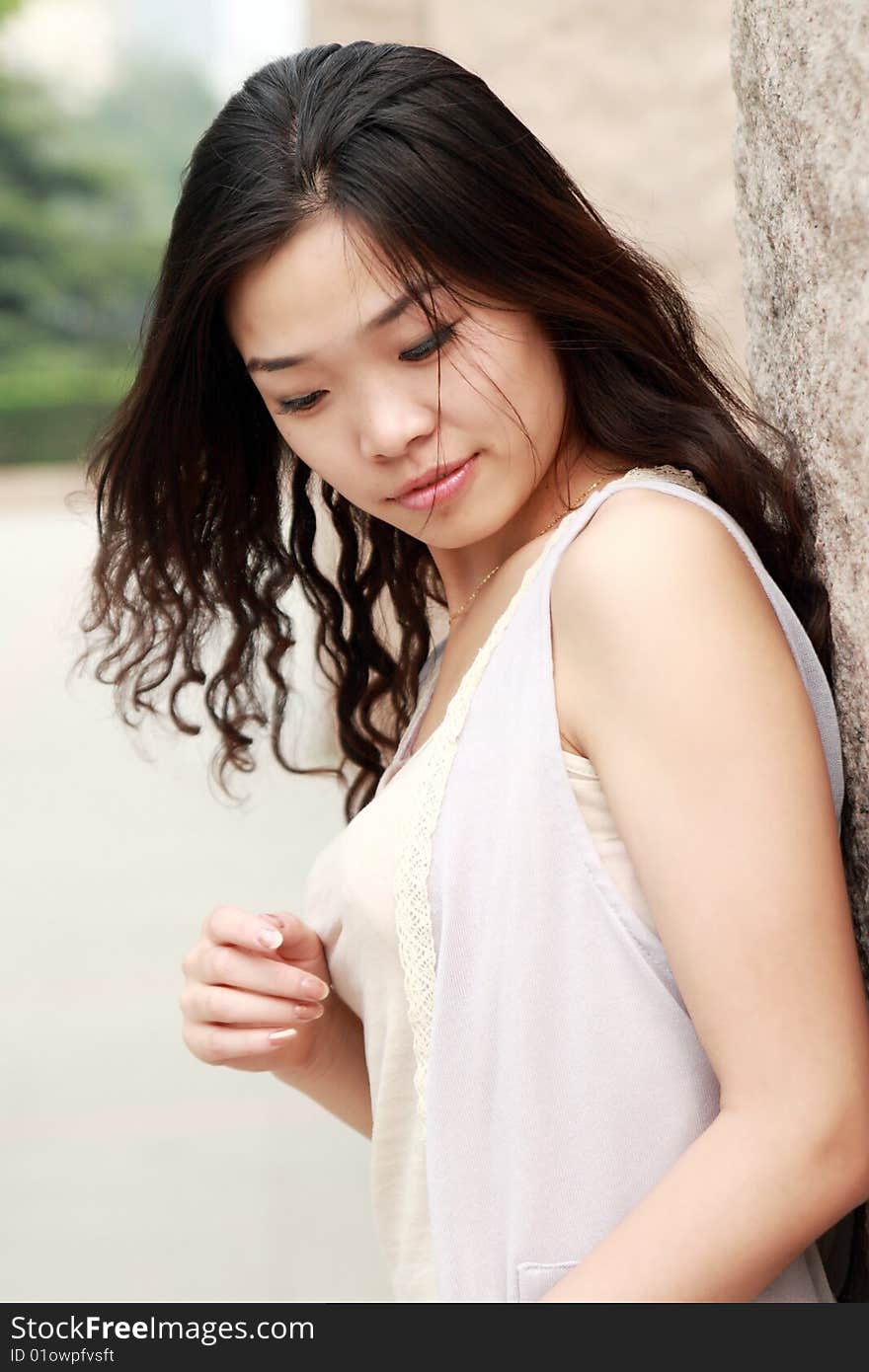 Asian girl's outdoor portrait in summer. Asian girl's outdoor portrait in summer.